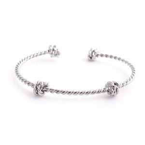 Spiral Copper Cable Cuff Bracelet with Love Knot